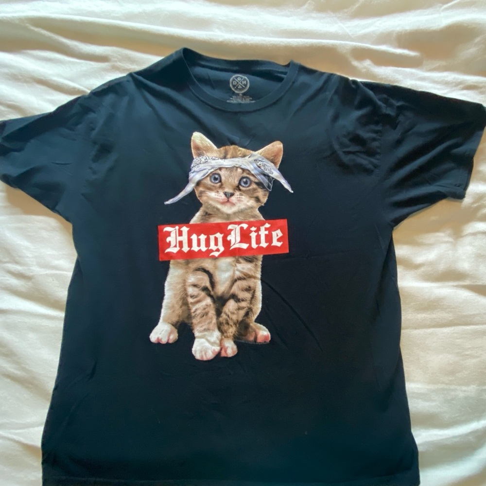 Shirt instead of Thug Life it says Hug Life Size XL